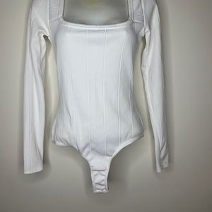 White bodysuit.